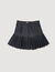 Falda corta de denim con volantes