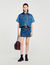 Falda corta de denim y cuero