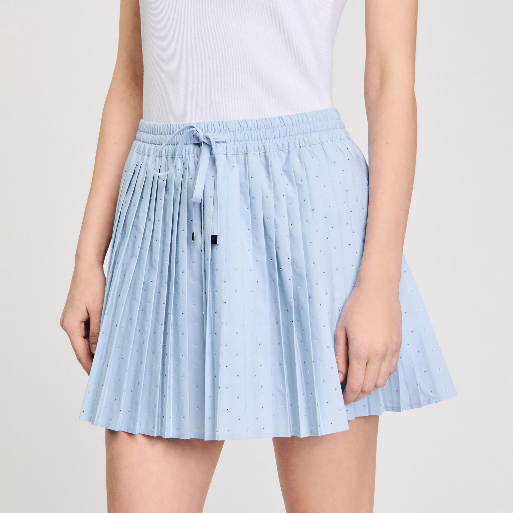 Falda corta plisada con strass - Mujer | Sandro
