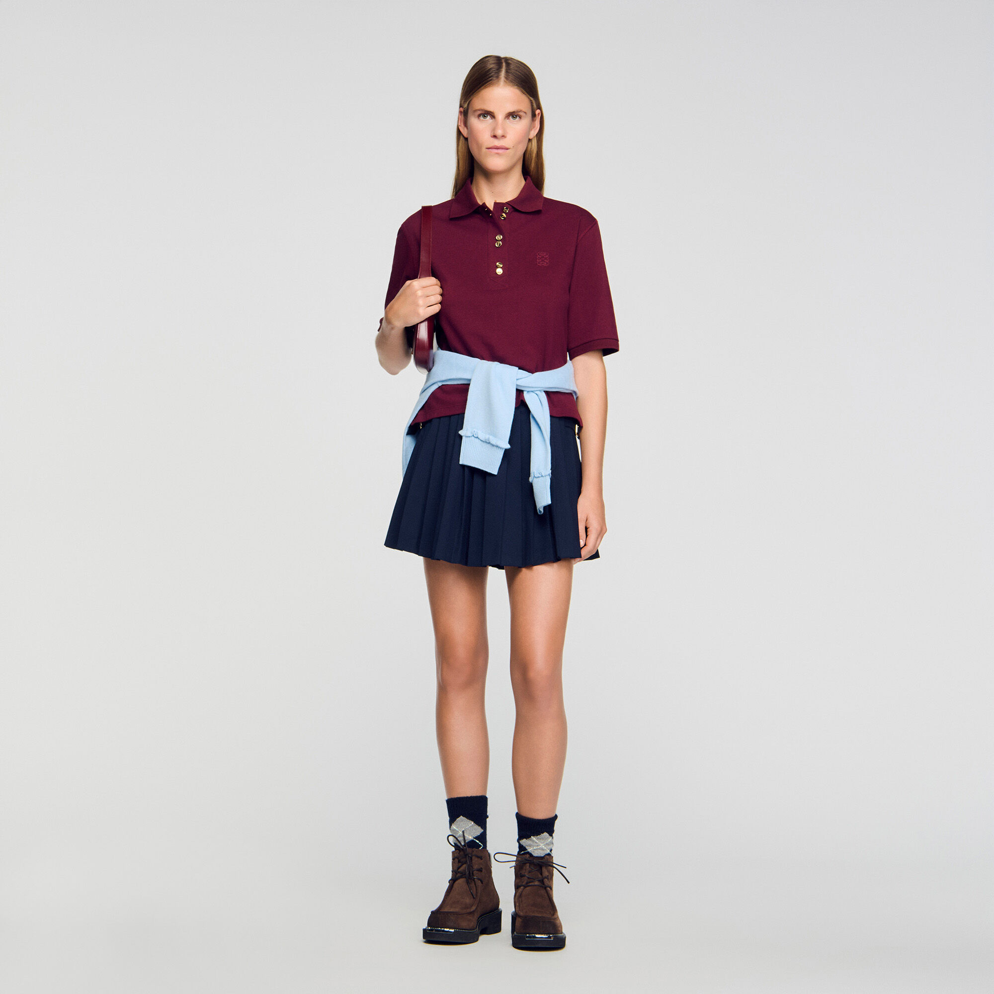 Polo con botones de fantasía