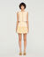 Falda corta con pliegues