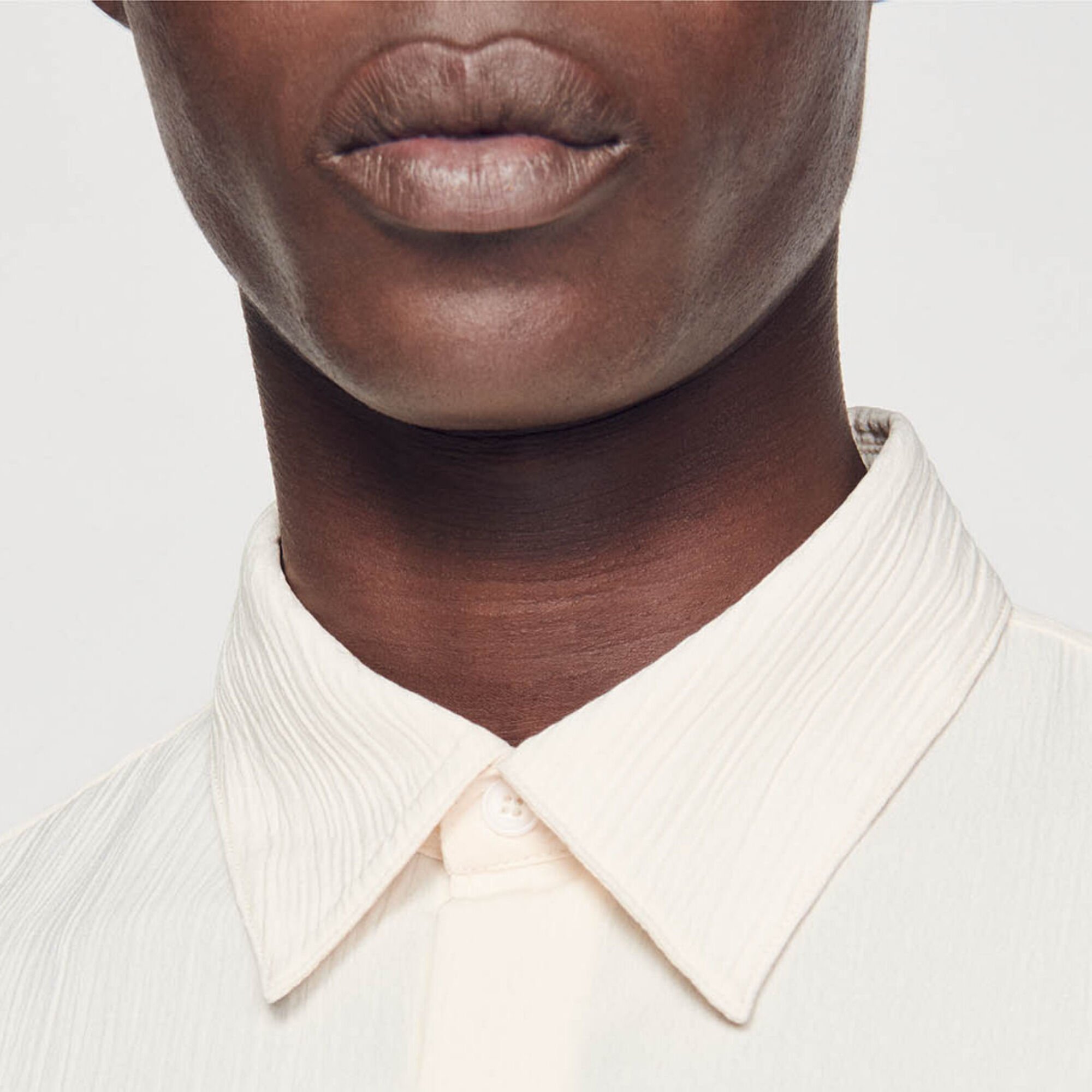 Camisa fluida plisada