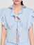 Top con volantes y strass
