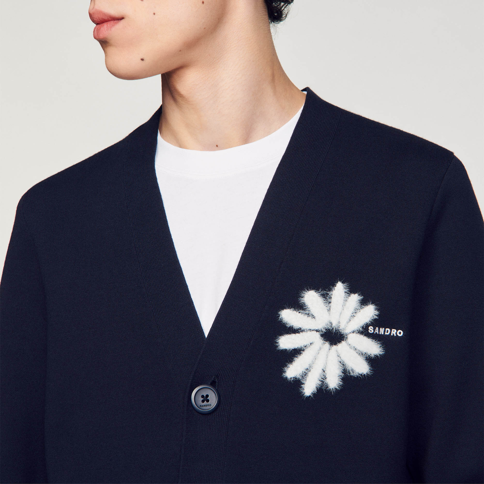 Cárdigan de punto con flor de jacquard