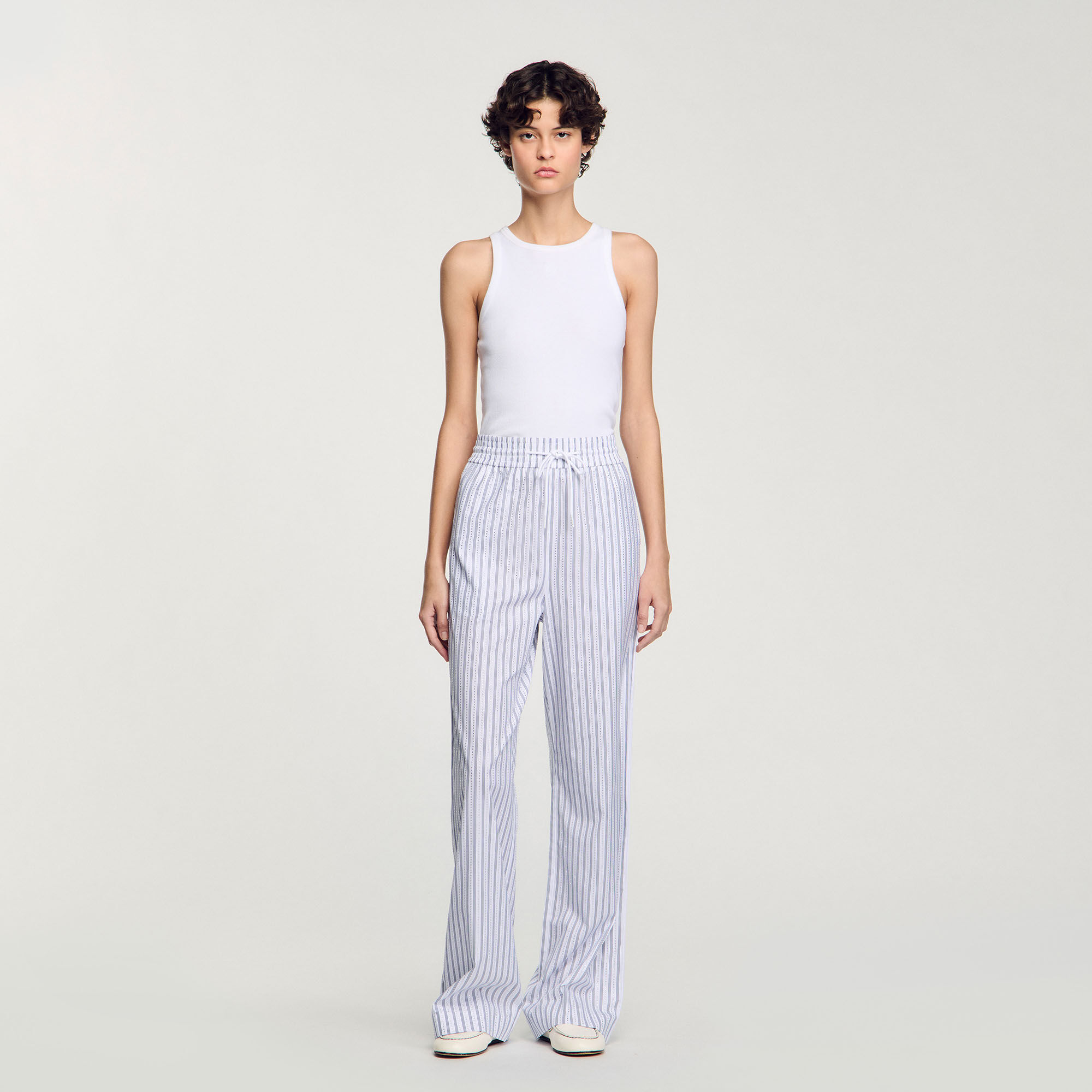 Pantalón a rayas con brillantes