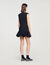 Vestido corto de sastre con volante