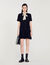 Vestido corto con corbata de lunares