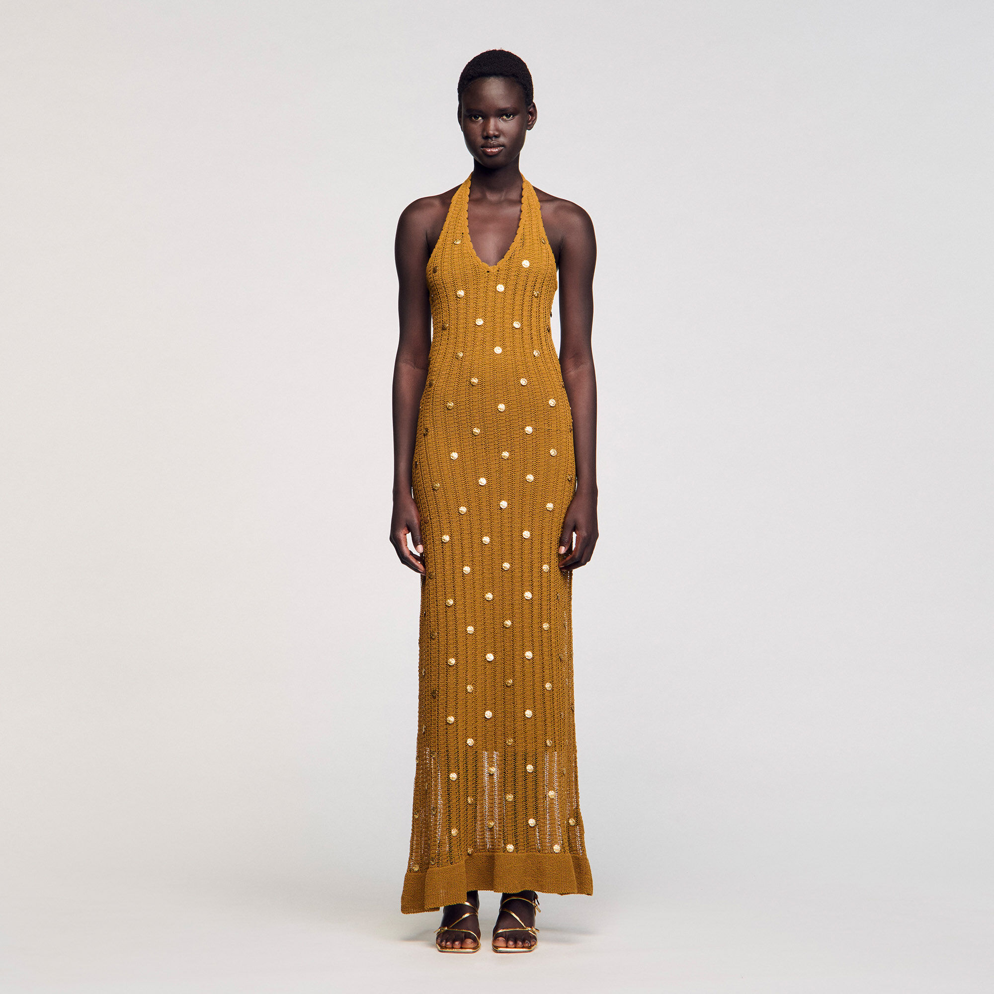 Vestido largo de punto con flecos