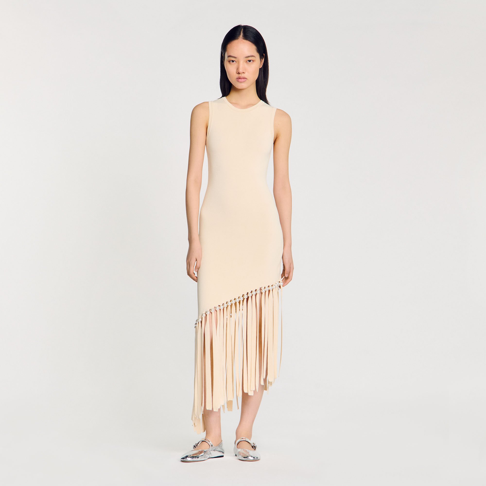 Vestido de punto con flecos y perla