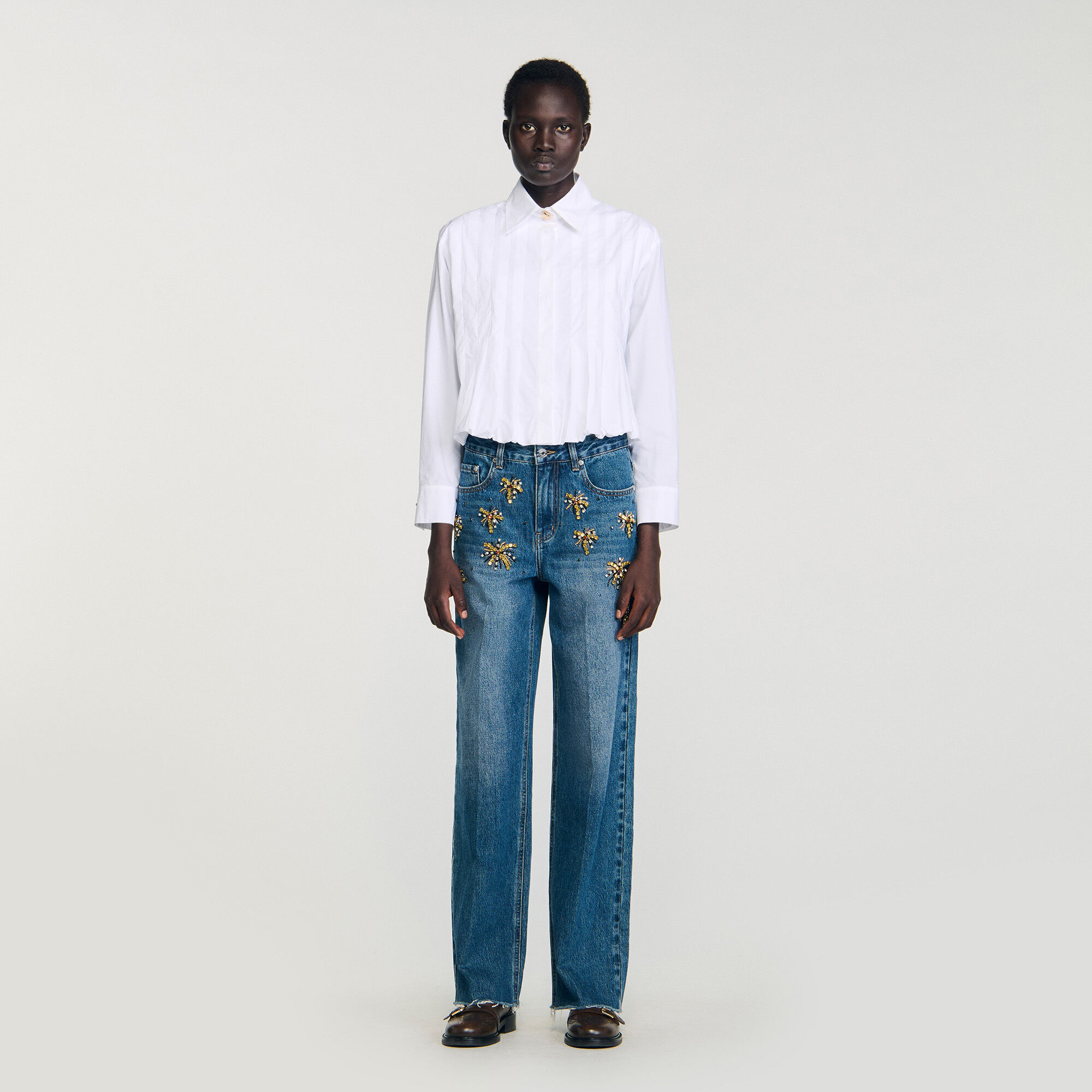 Camisa corta con pliegues
