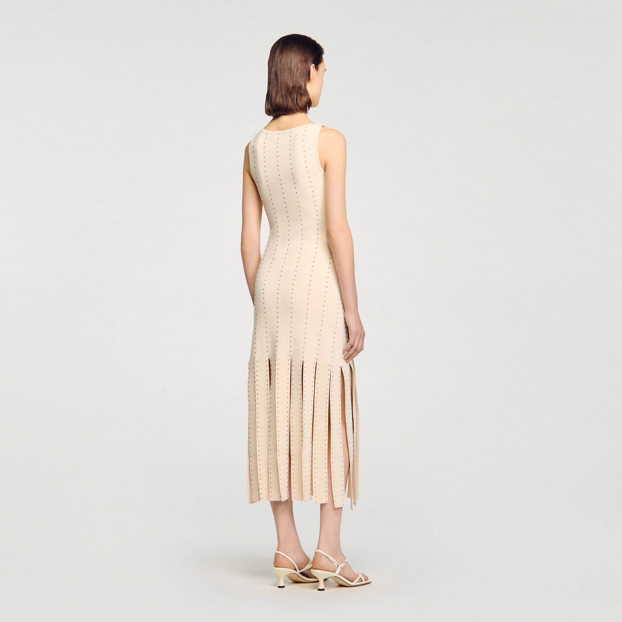Vestido largo de punto con flecos