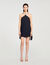Vestido corto con capa adornada