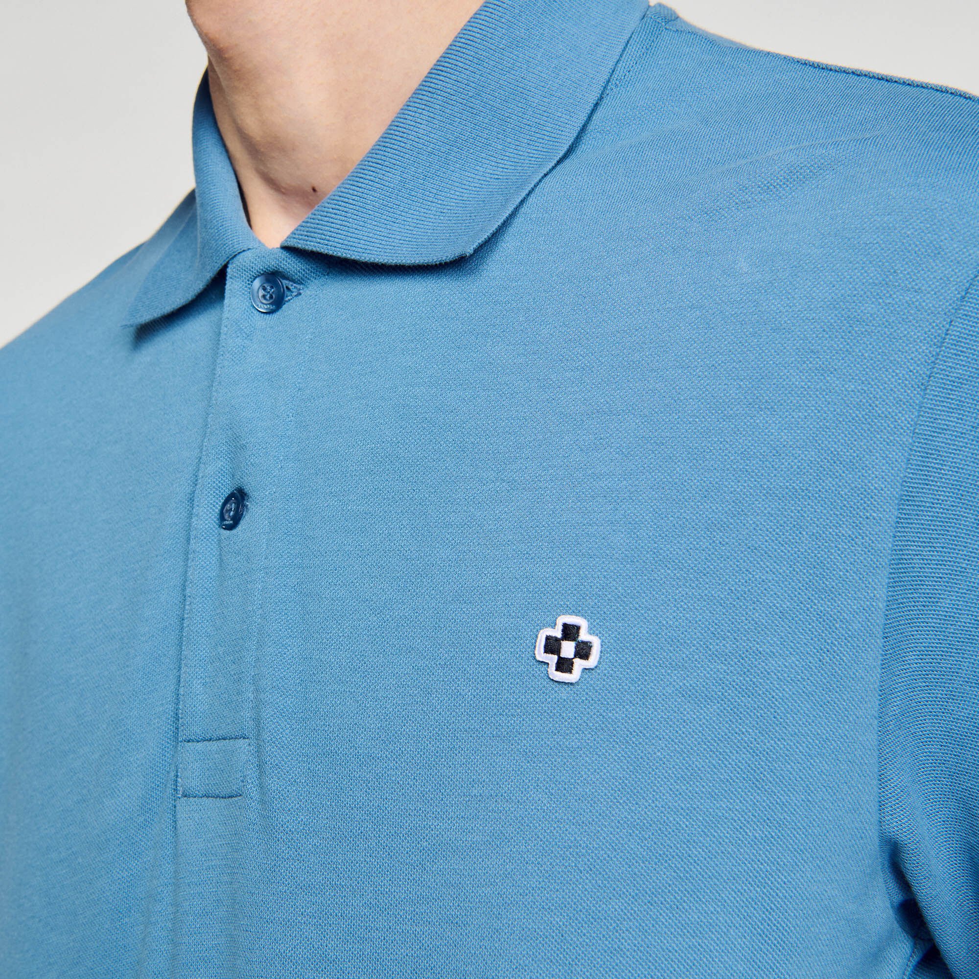 Polo con parche Square Cross