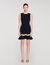 Vestido corto de punto con cadena