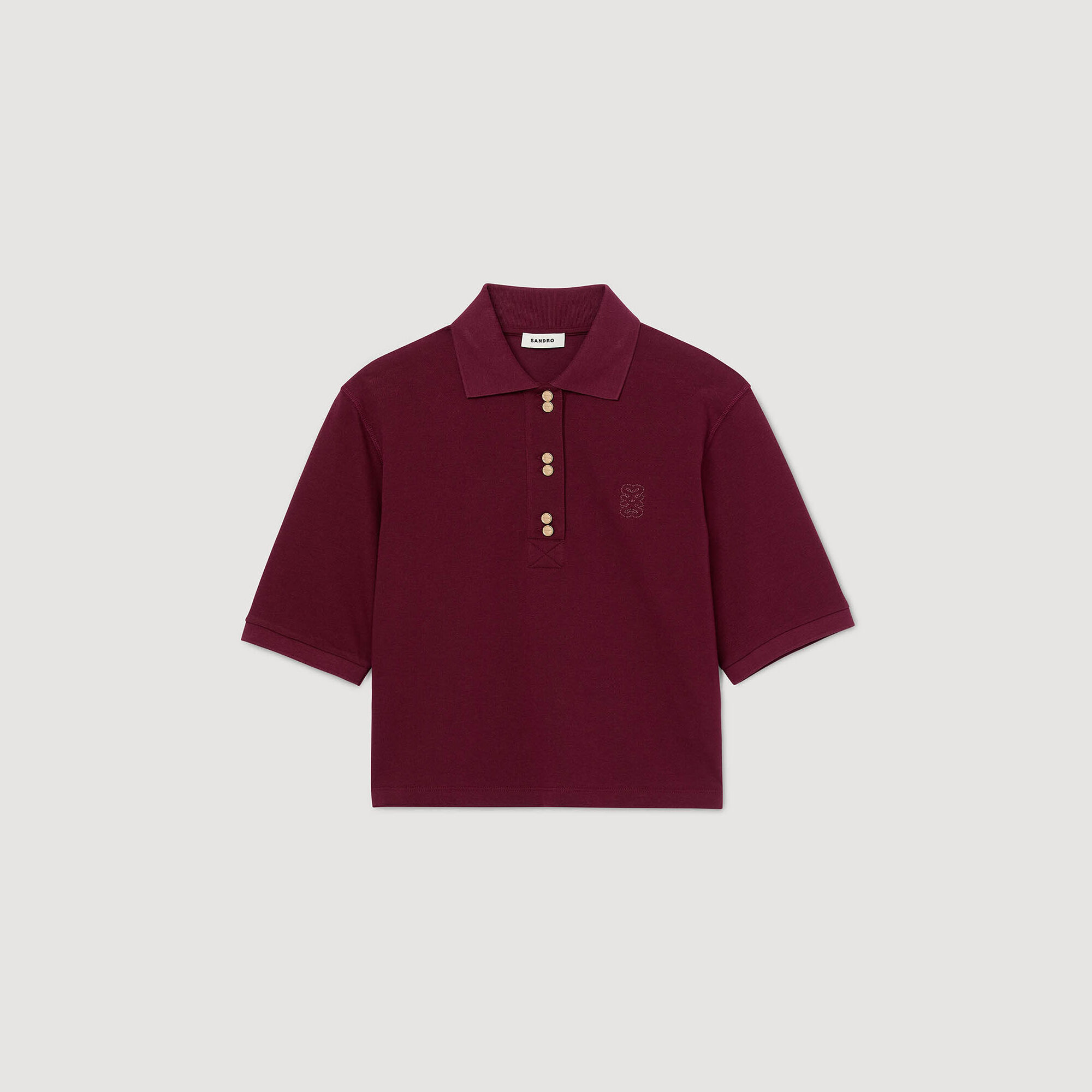 Polo con botones de fantasía