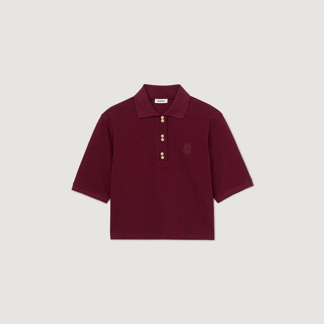 Polo con botones de fantasía